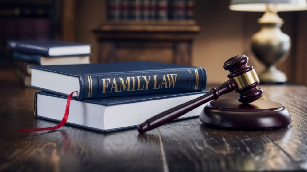 Calgary Alberta Separation Agreement Lawyers portrayed by family law legal texts on a wooden desk.